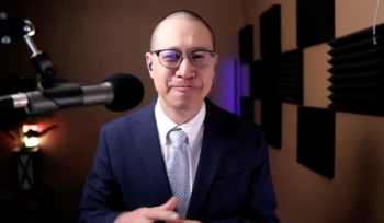 Wayne Kuang, MD, answers a question during a Zoom video interview