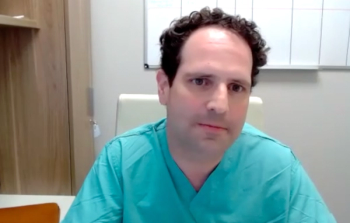 Colin Goudelocke, MD, answers a question during a Zoom video interview