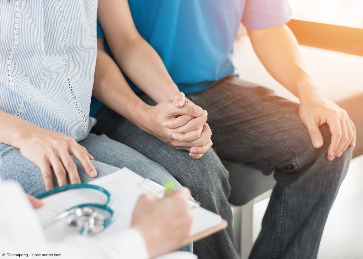 Couple talking with doctor | Image Credit: © Chinnapong - stock.adobe.com 