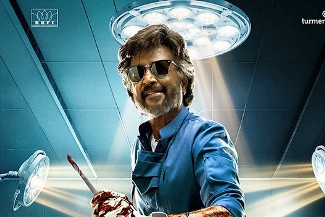 Film poster showing a man in sunglasses and blue surgical scrubs holding a bloodied scalpel in an operating theatre