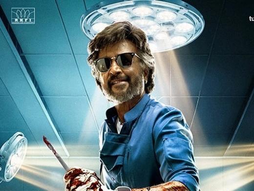 Film poster showing a man in sunglasses and blue surgical scrubs holding a bloodied scalpel in an operating theatre