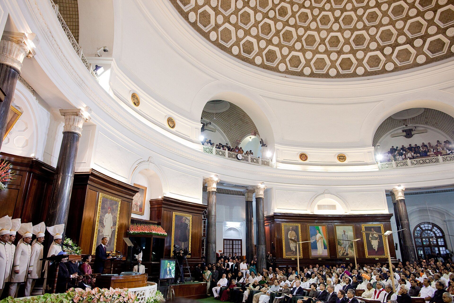 Members of Parliament seated under the dome of the Central Hall of India's old Parliament building during a joint session