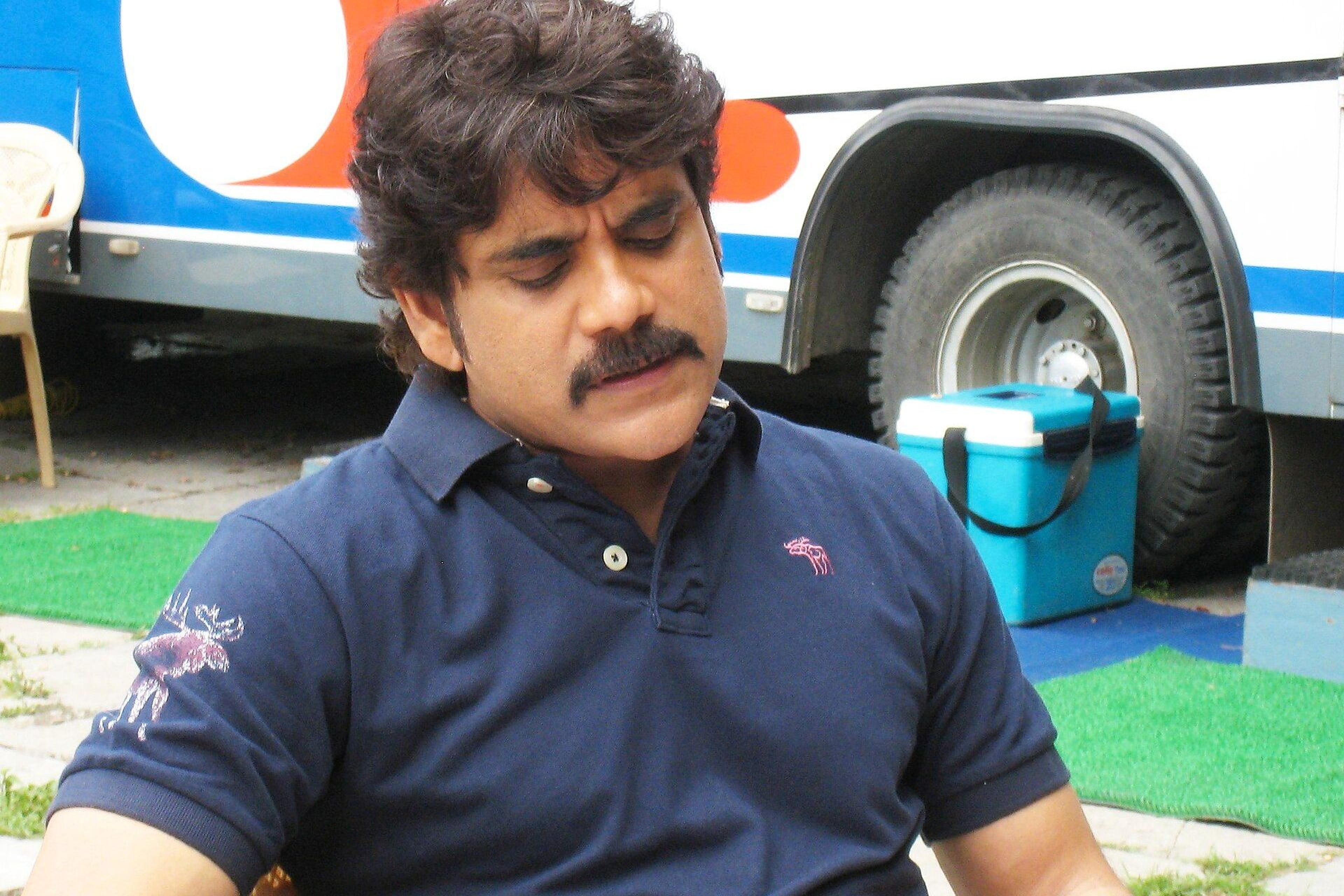 Nagarjuna reads a script at Annapurna Studios in Hyderabad before recording a voice-over.