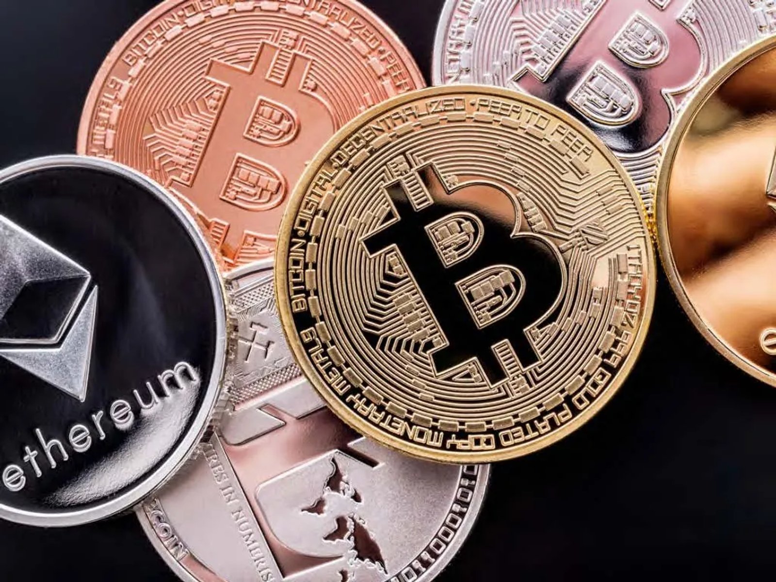 No money: Criptomonedas y pagos digitales como sustitutos del dinero.