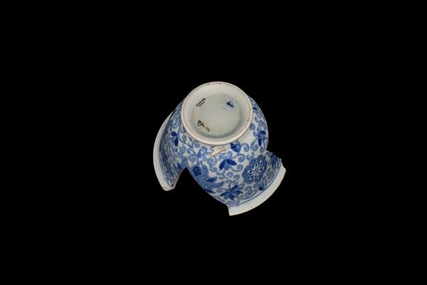 A top-down view of the cup showing its accession number.