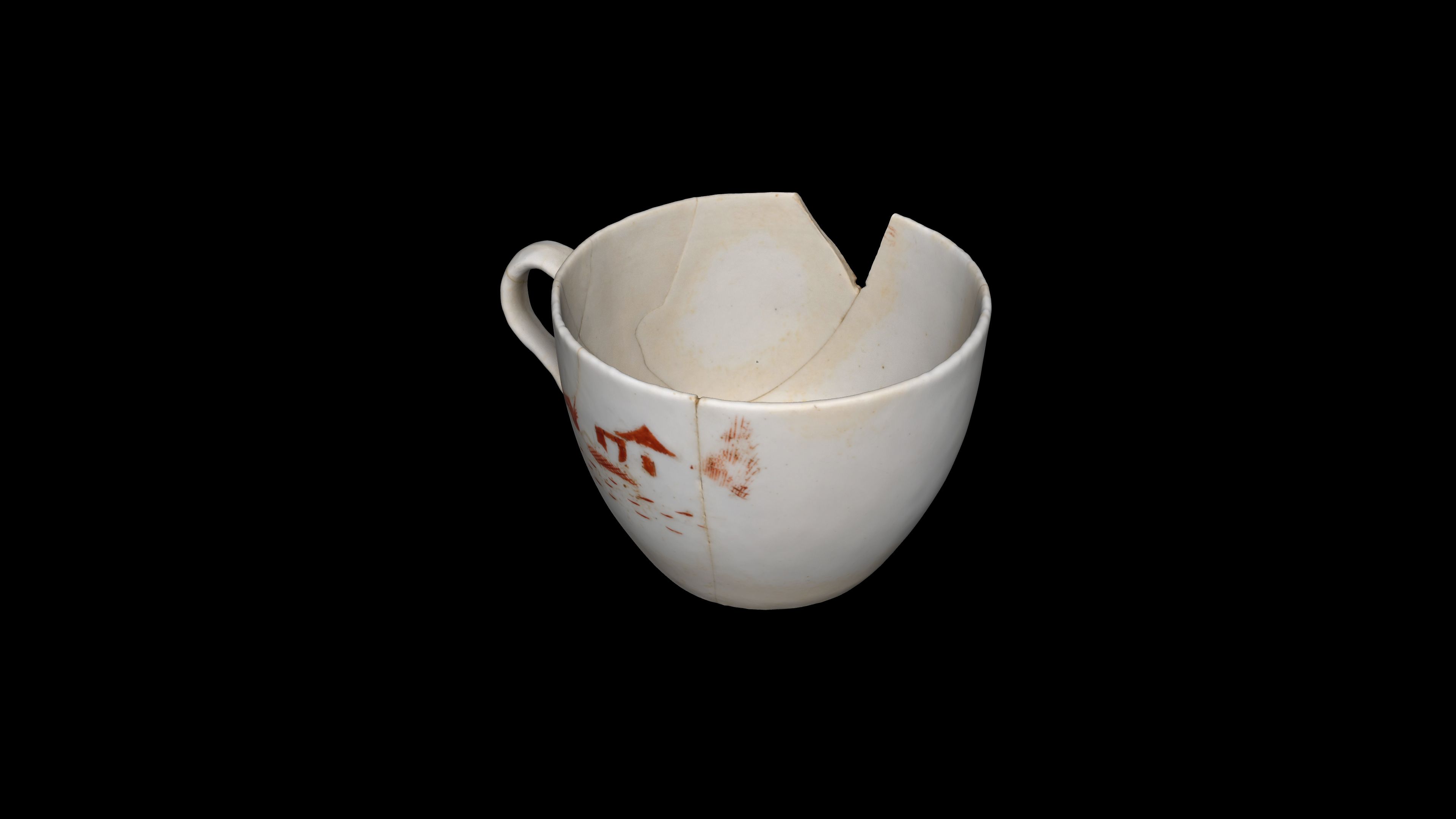 A white cup on a black background