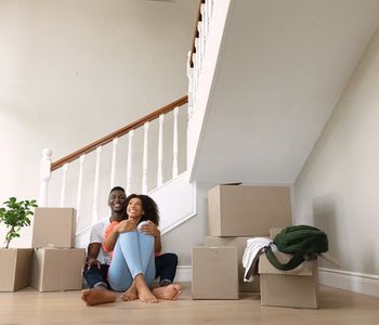 Couple moving in to new house.