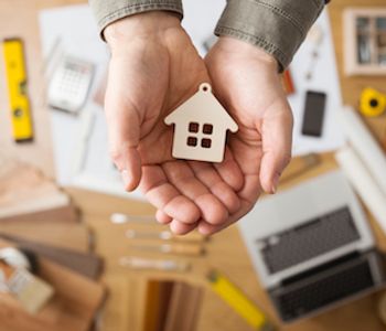 VA home loan concept in hand.