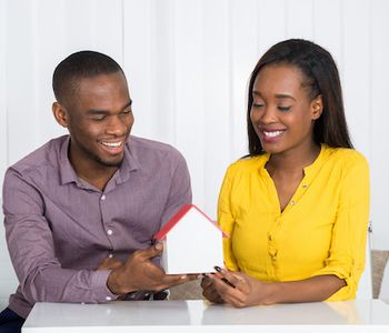 Couple discussing about VA Home loan appraisal process.