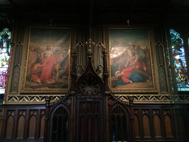 Paintings and carved decoration inside Notre-Dame Basilica.