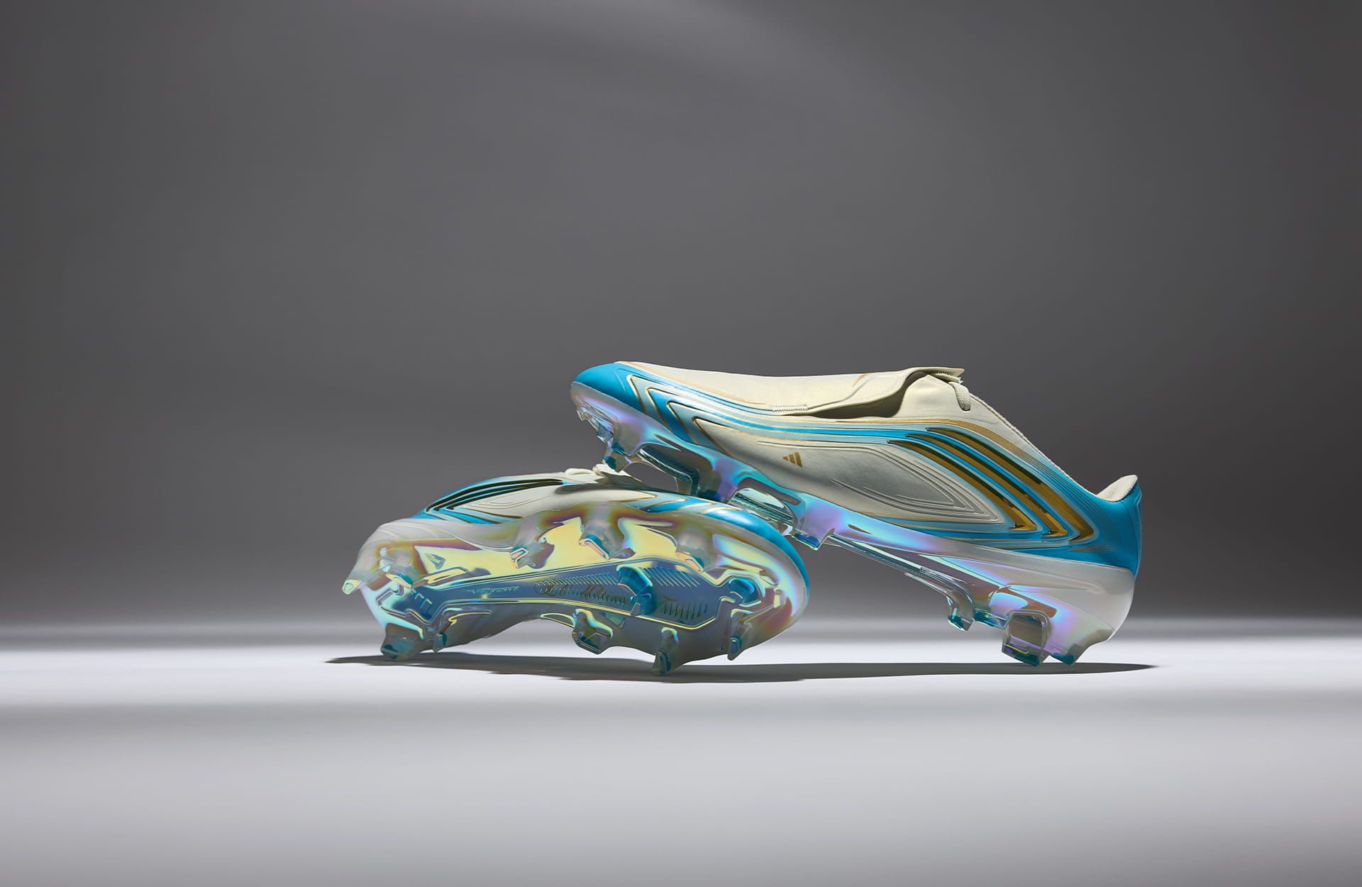 F50 Messi El Ultimo Tango lateral view showing the Ivory/Semi Blue Burst colorway and claw-like Three Stripes