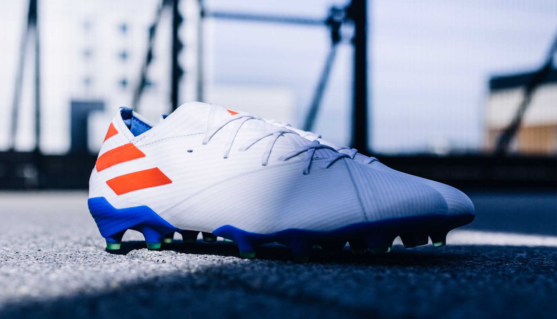 Nemeziz Messi 19.1 "302 Redirect" lateral side view, White/Solar Red/Football Blue colorway