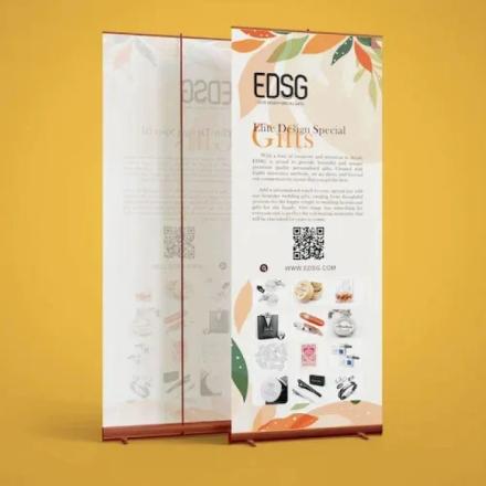 Orange background with a white branded roller banner in the center. 