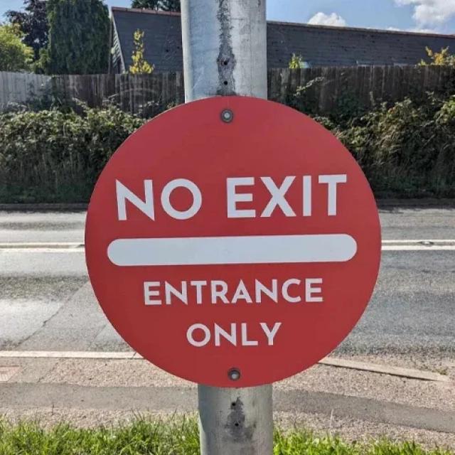 Red 'No exit' sign with bold white text. 