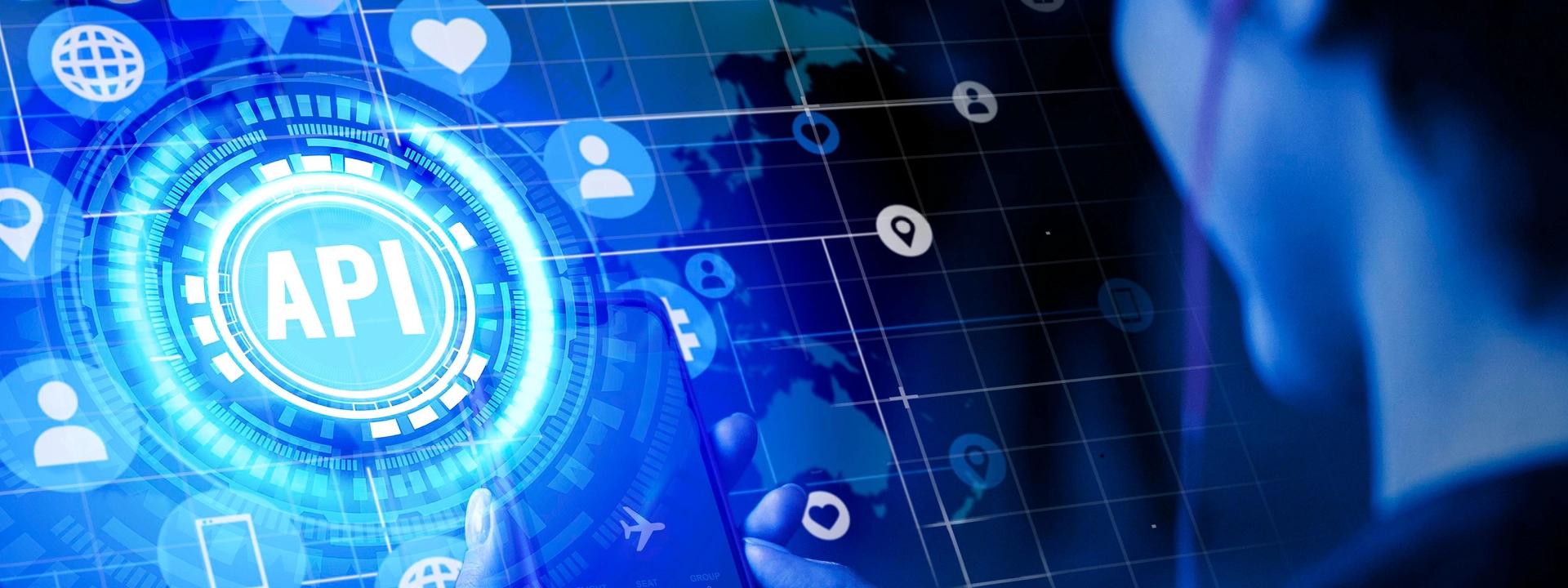 A glowing blue digital interface with the letters 'API' at its center, surrounded by various interconnected icons representing data, communication, and global networks, suggesting the concept of API integrations and connectivity.