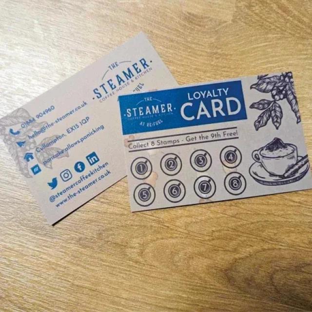White and blue business loyalty cards. 