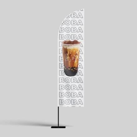 Branded white banner, with iced drink on. 