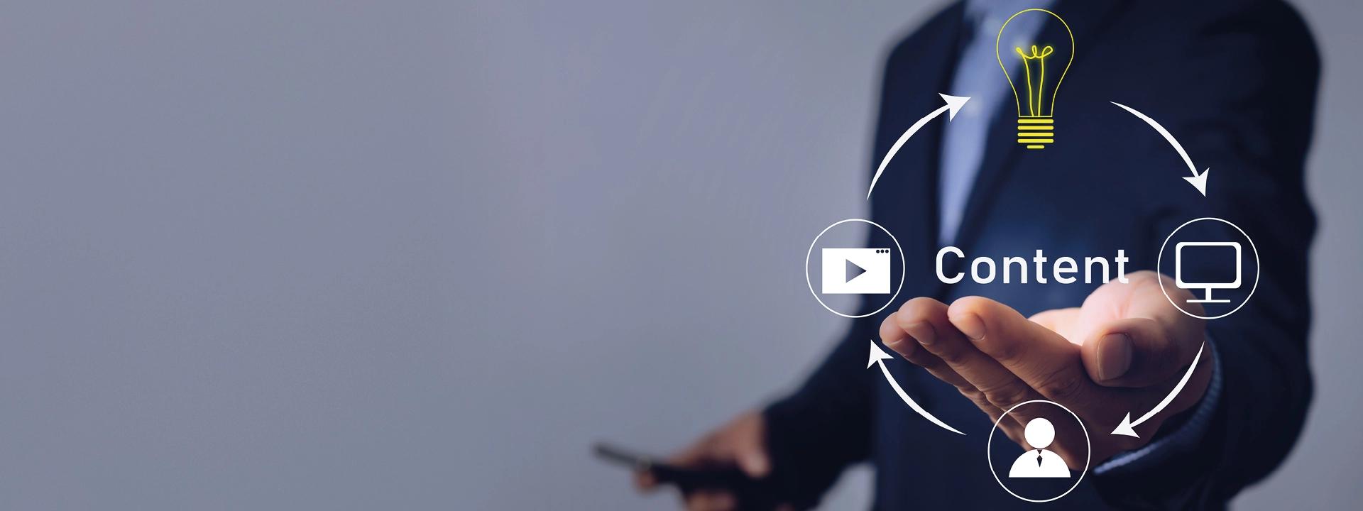 A person in a suit holding out their hand with a circular diagram above it, illustrating a content strategy with icons for video, content, desktop, and audience, all leading to a lightbulb idea.
