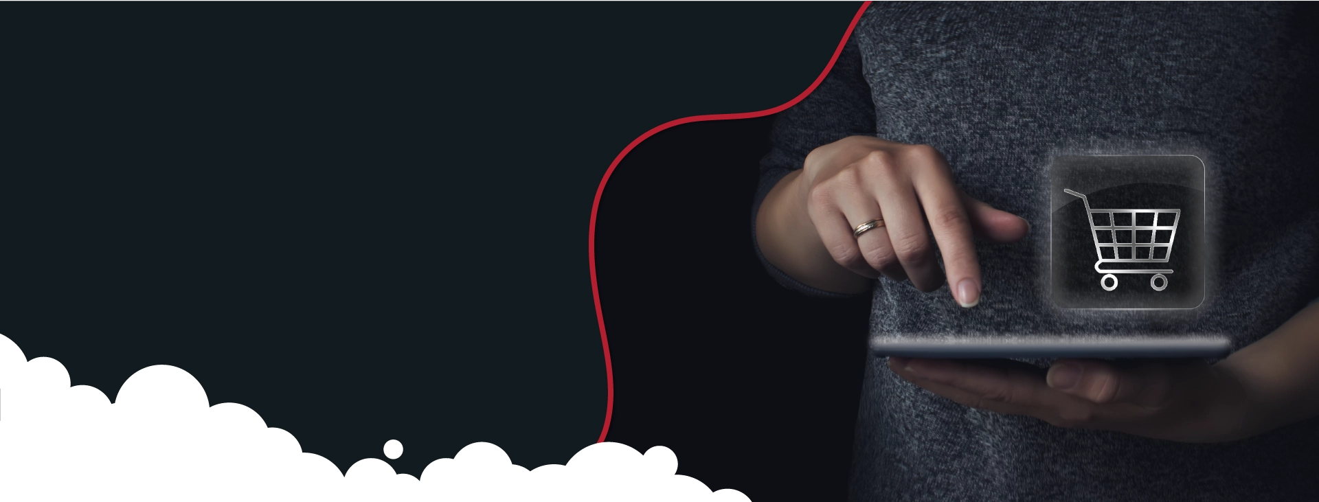 A person is holding and interacting with a tablet, with a prominent shopping cart icon floating above the screen, symbolising e-commerce or media buying.