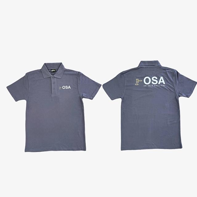 Grey button up polo shirt, with branding on the front and back. 