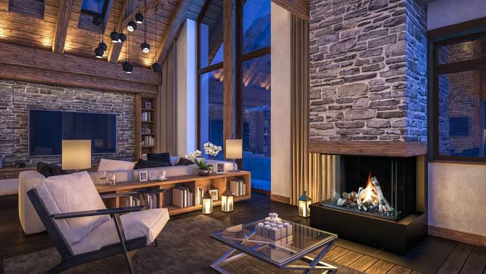 Cozy living room with stone fireplace, large windows, and wooden beams.