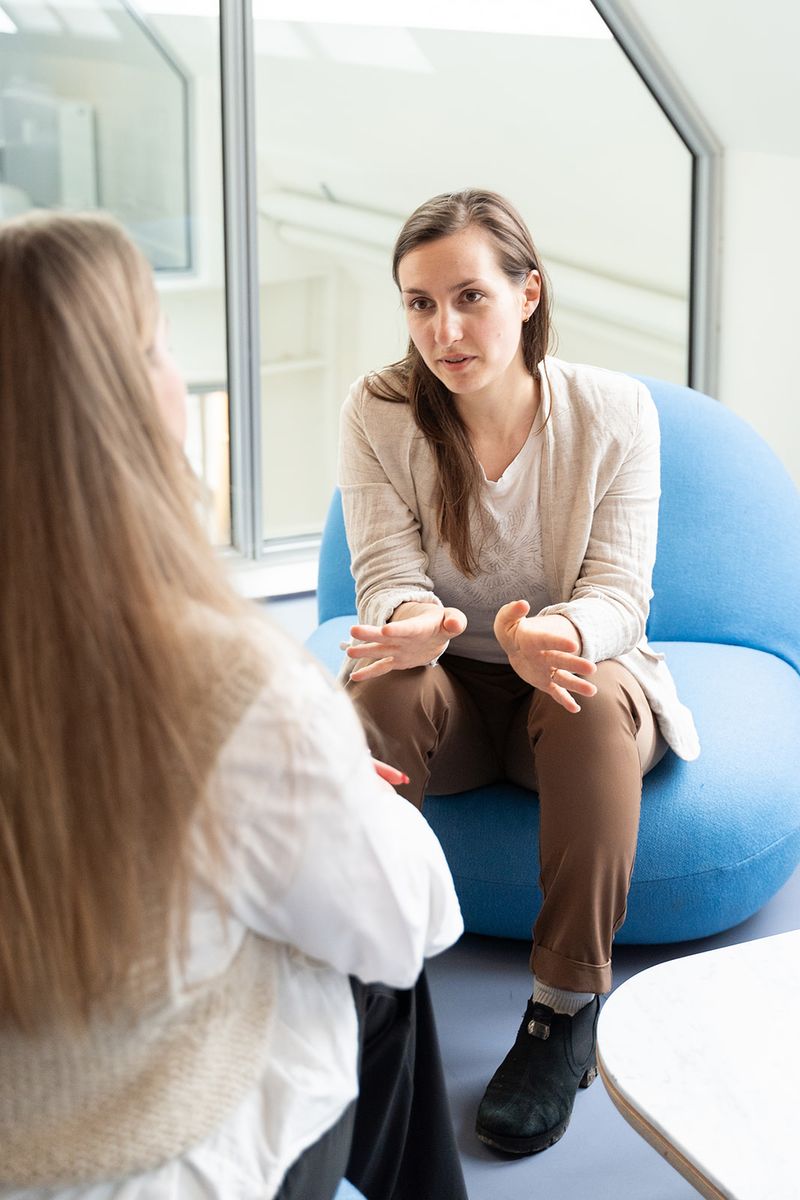 Maja Herrero in a private coaching conversation, warm and present