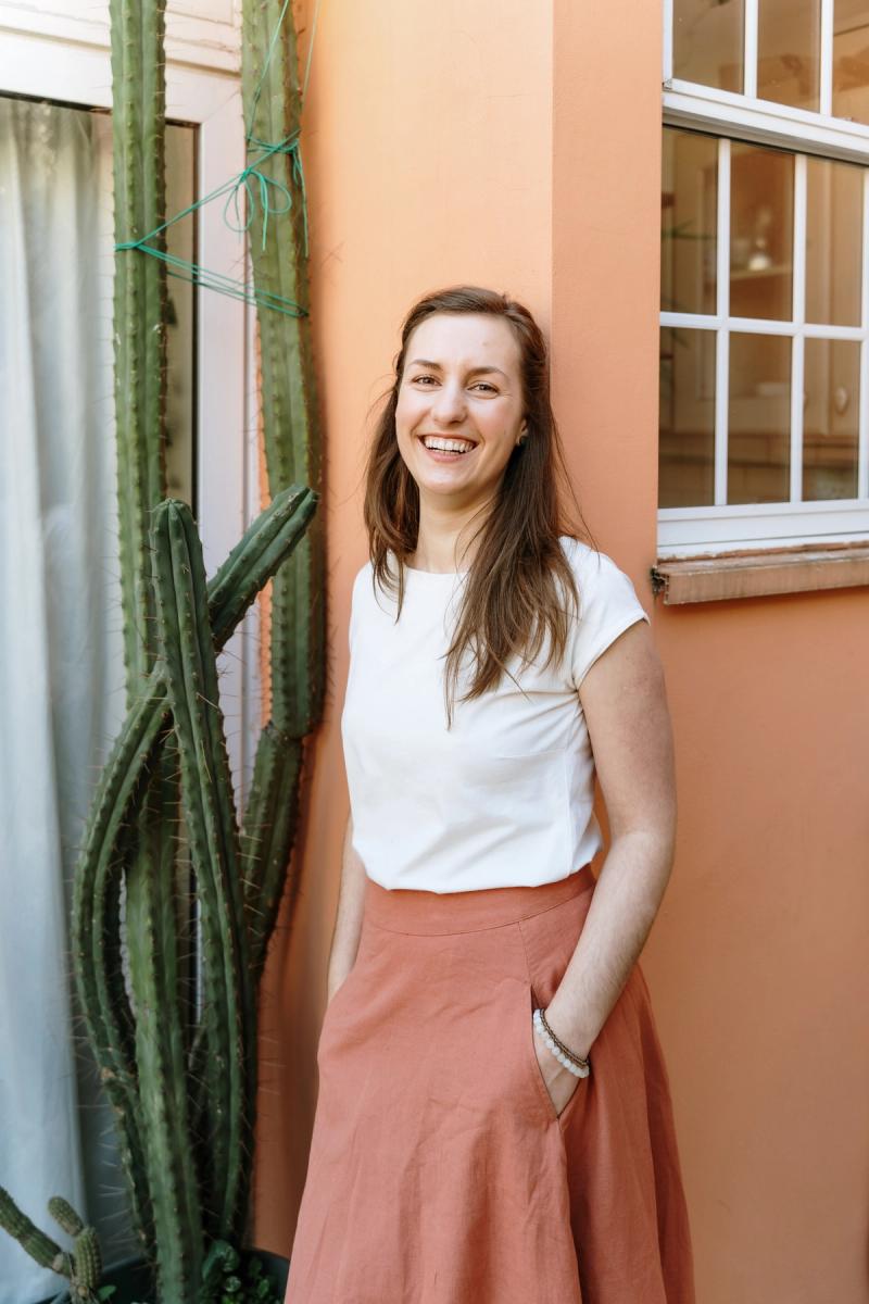 Maja Herrero smiling warmly in natural light
