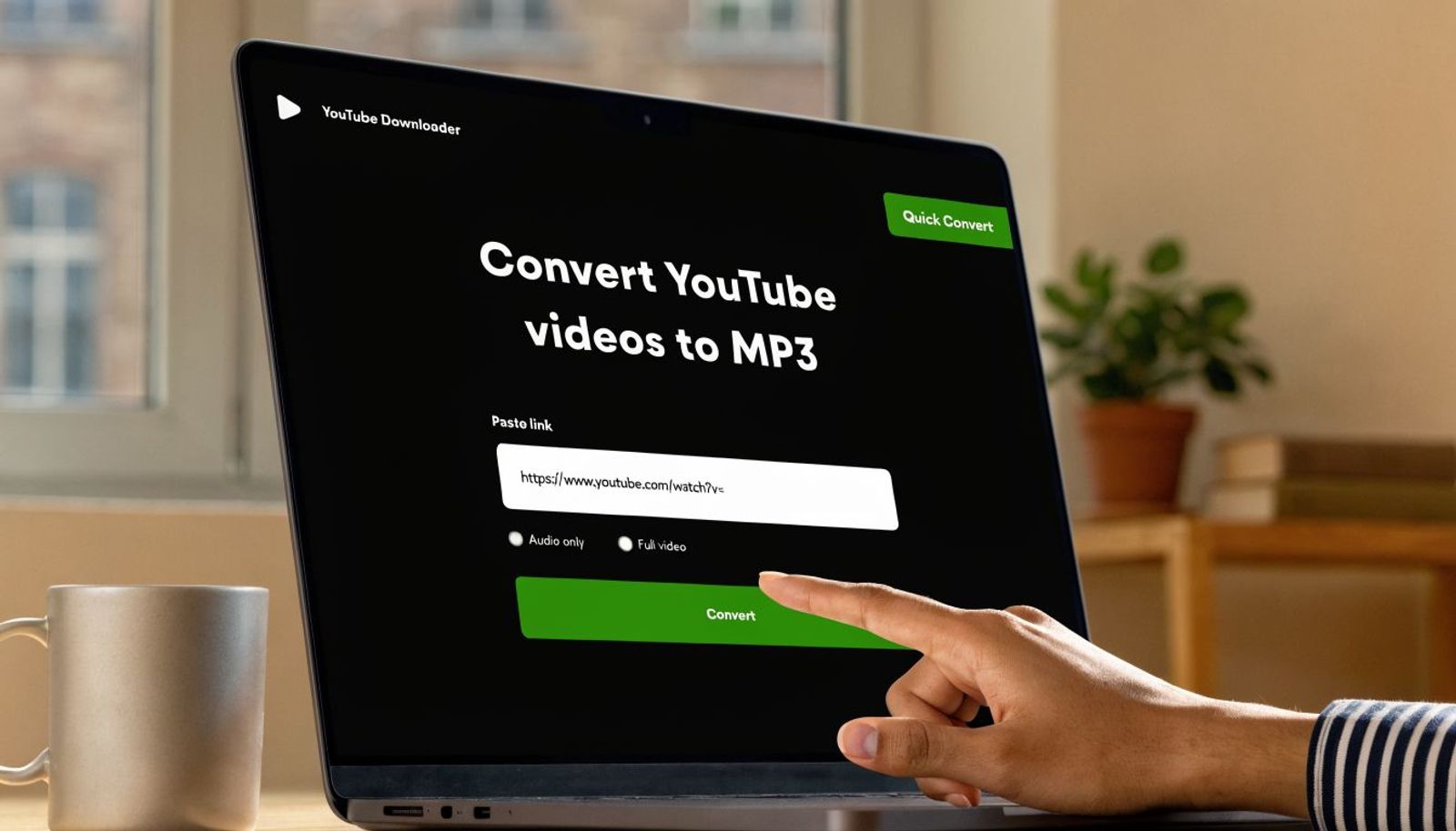 A person clicking the convert button on a website designed for downloading YouTube videos to MP3 files.