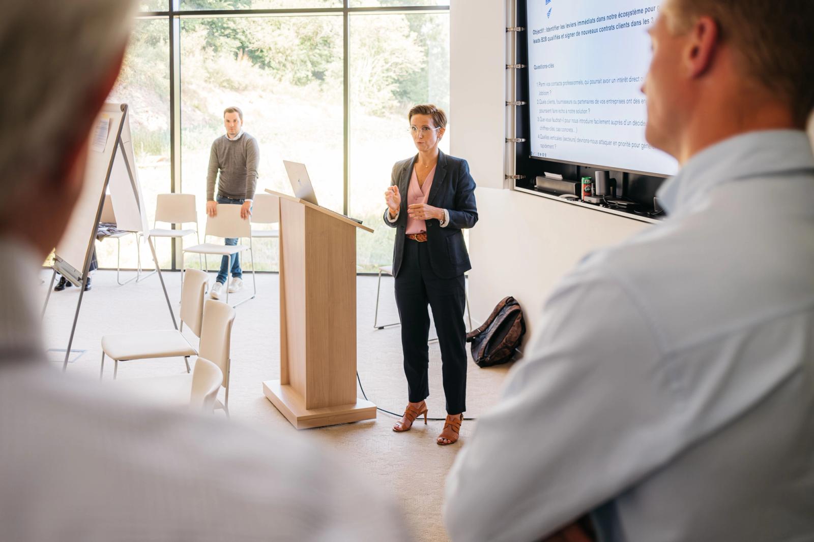 Amélie Alleman, founder of Jobloom, delivering a strategic presentation during an investor day event.