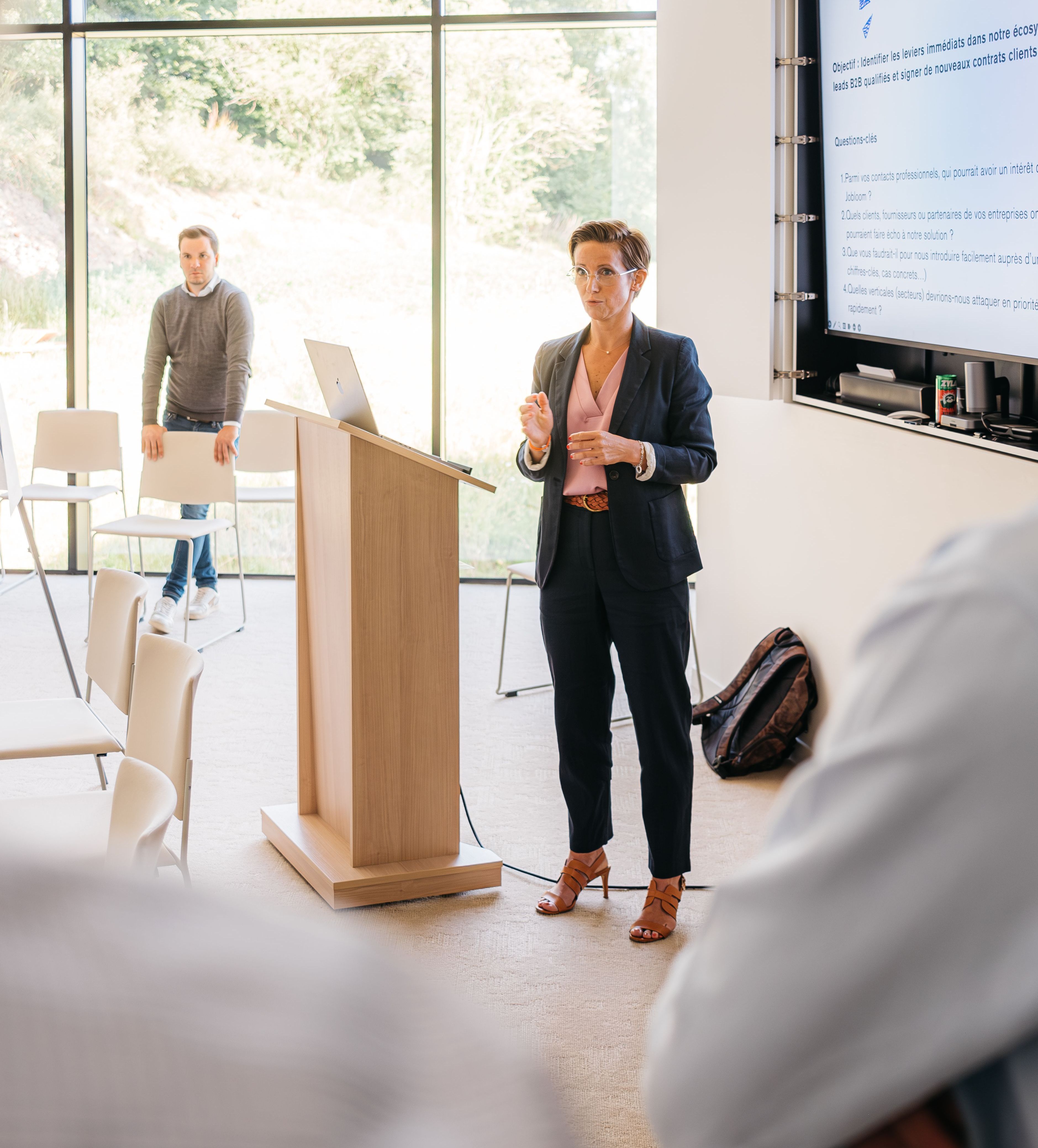 Amélie Alleman, founder of Jobloom, delivering a strategic presentation during an investor day event.