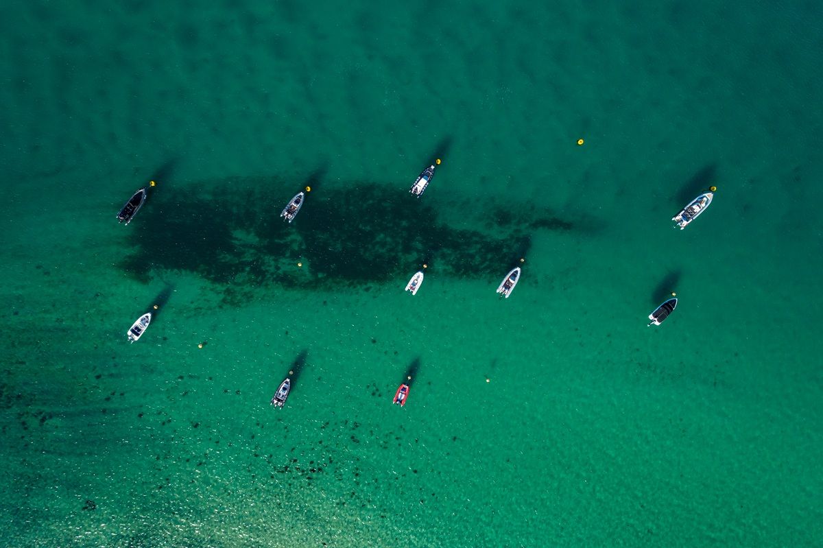 Aerial view of speed boats moored up, Cornwall