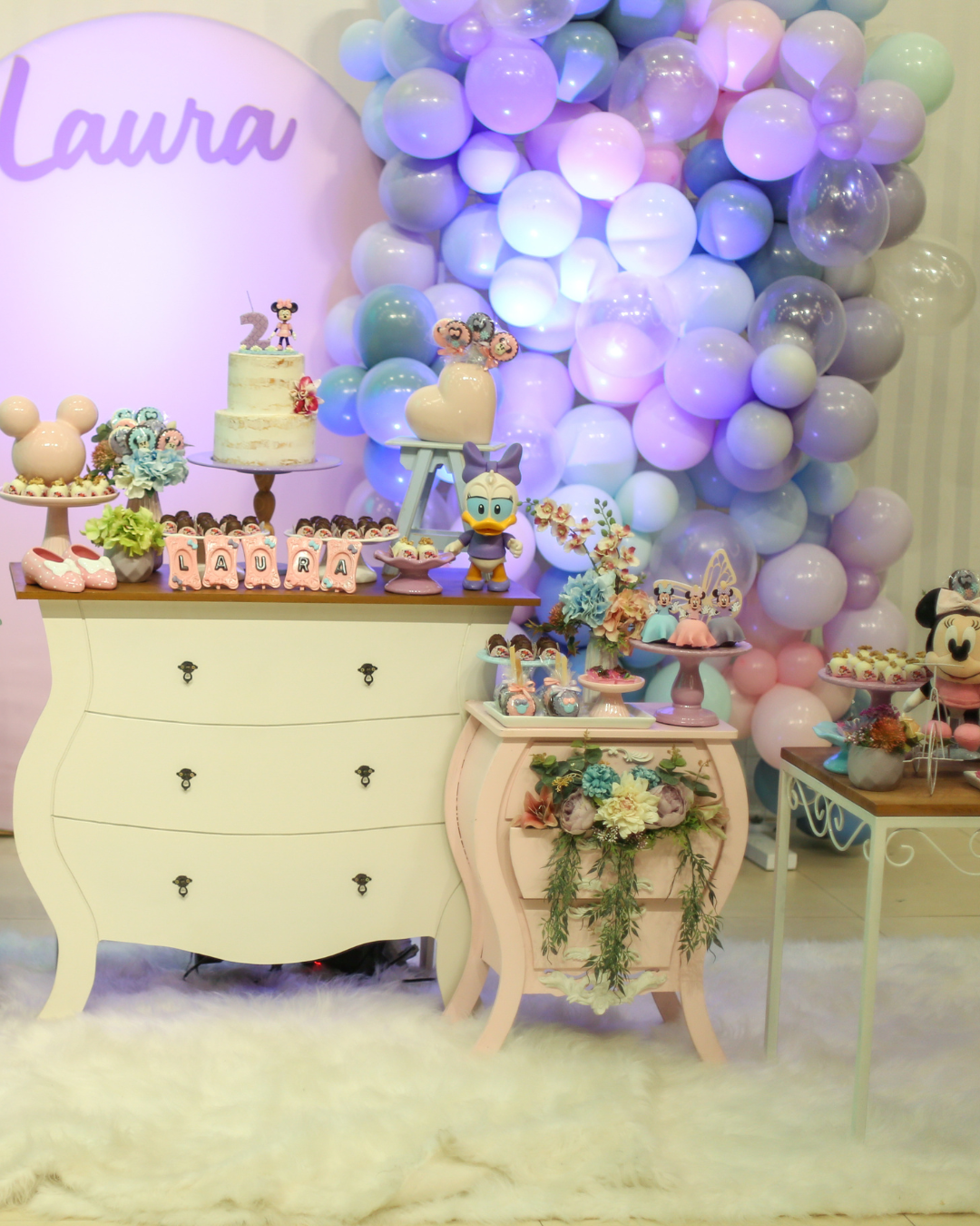 Purple Balloon Garland with custom backdrop and accessories