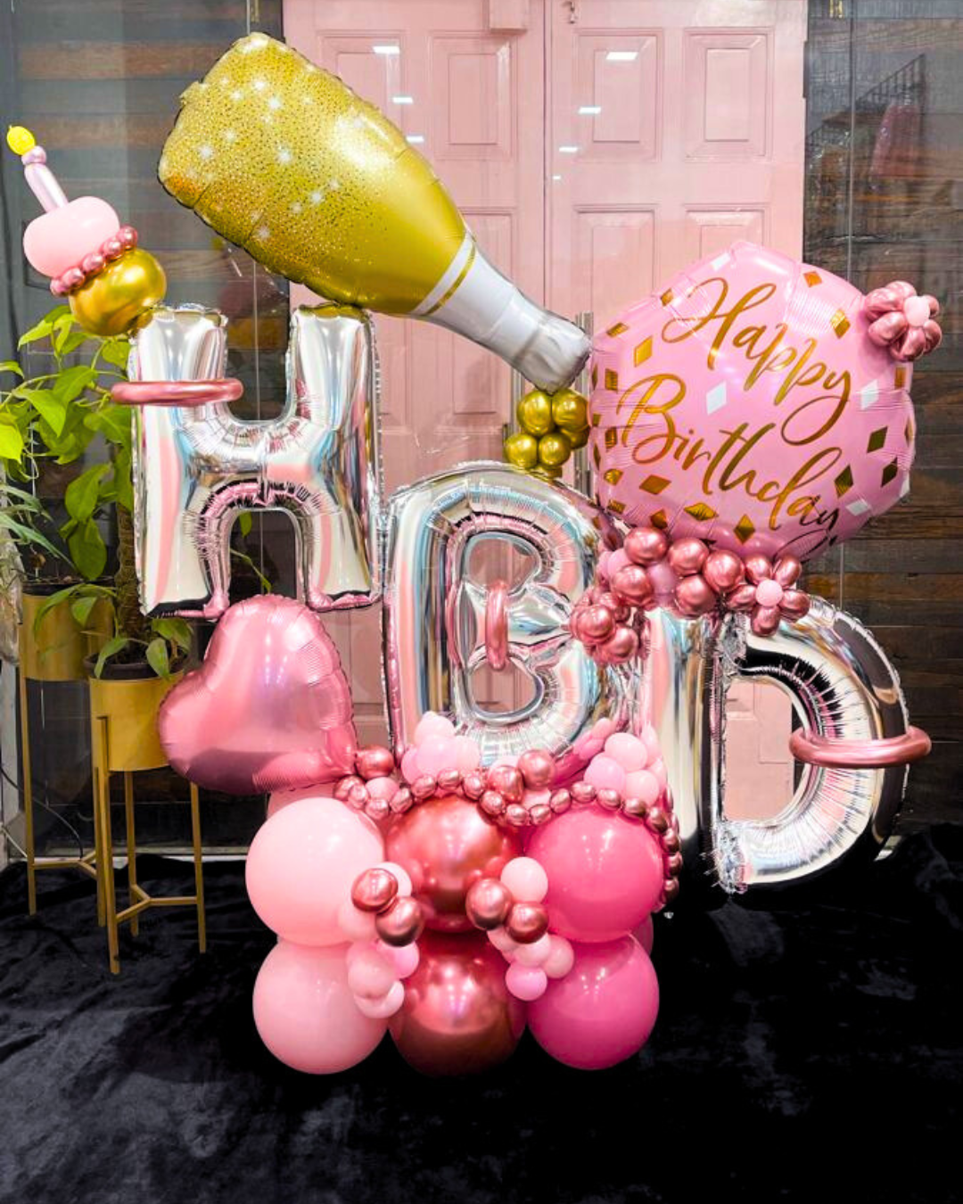 Custom balloon bouquet with foil letters and balloons
