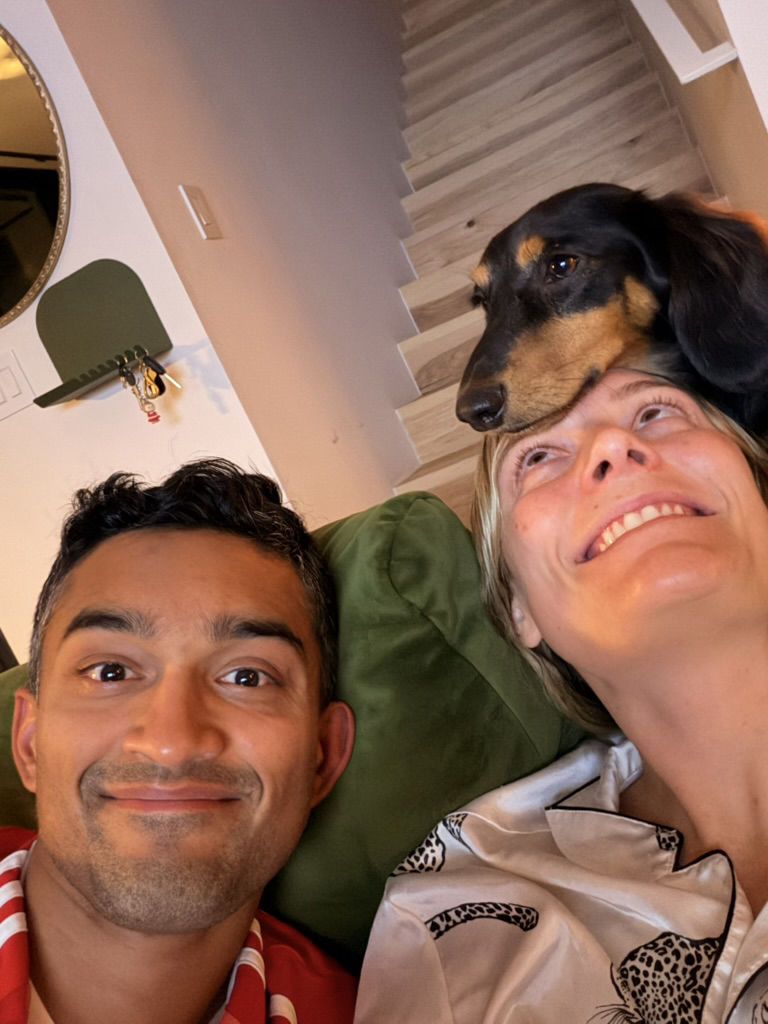 Daniel, Alex, and Sammy the dachshund on the couch