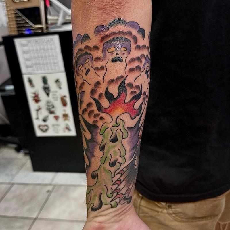 colorful japanese style tattoo on forearm