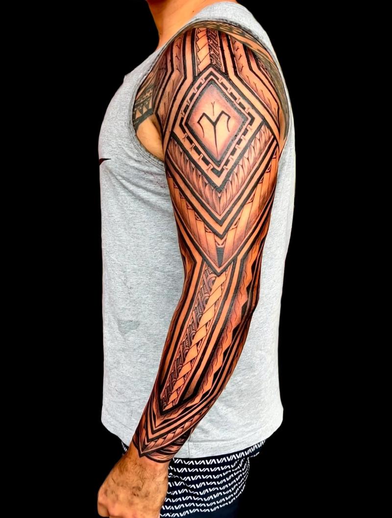 Blackwork tribal geometric full sleeve tattoo