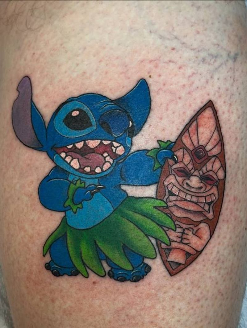 Colorful cartoon character tattoo on thigh