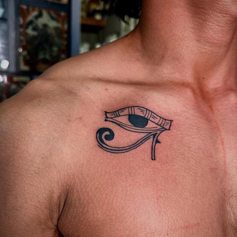 black eye of horus tattoo on chest