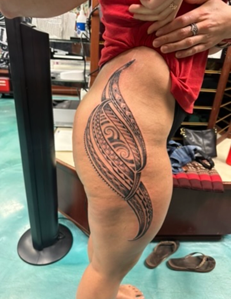 Blackwork tribal pattern on thigh