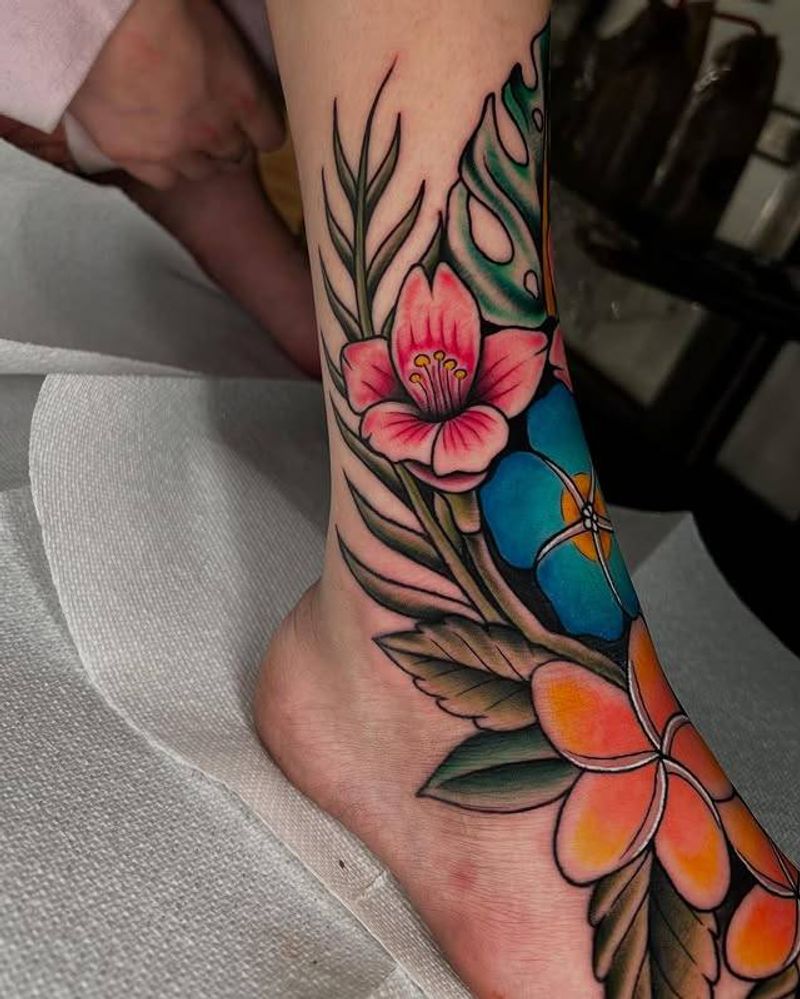 Colorful neo traditional floral tattoo on foot