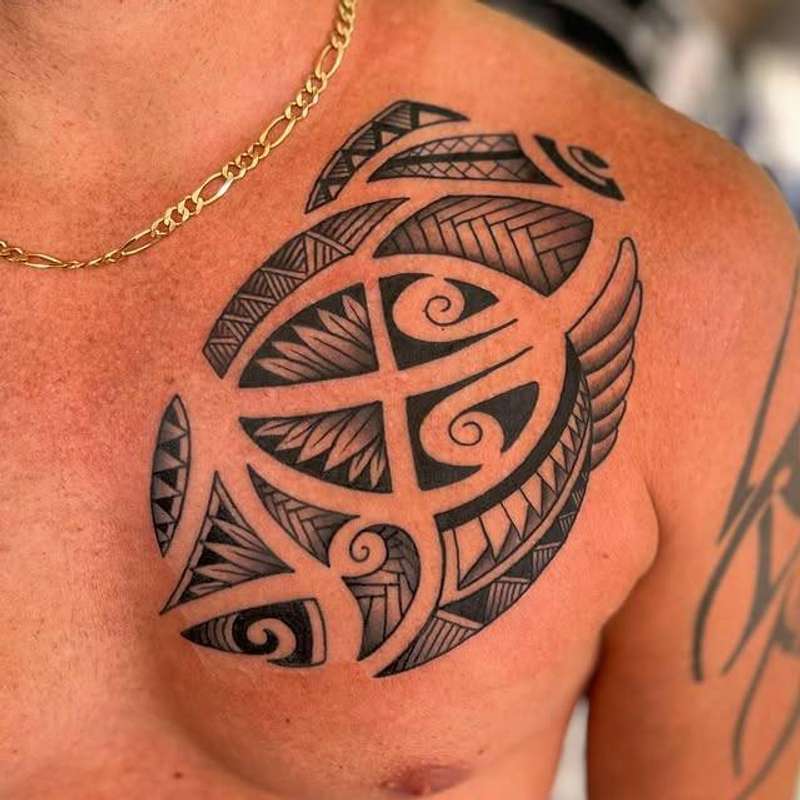 tribal design tattoo on chest