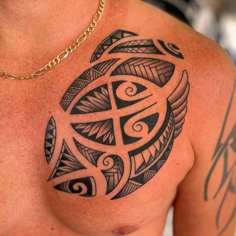 tribal design tattoo on chest