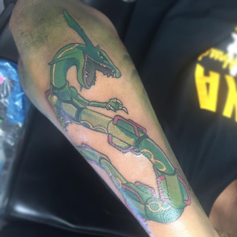 colorful dragon tattoo on forearm