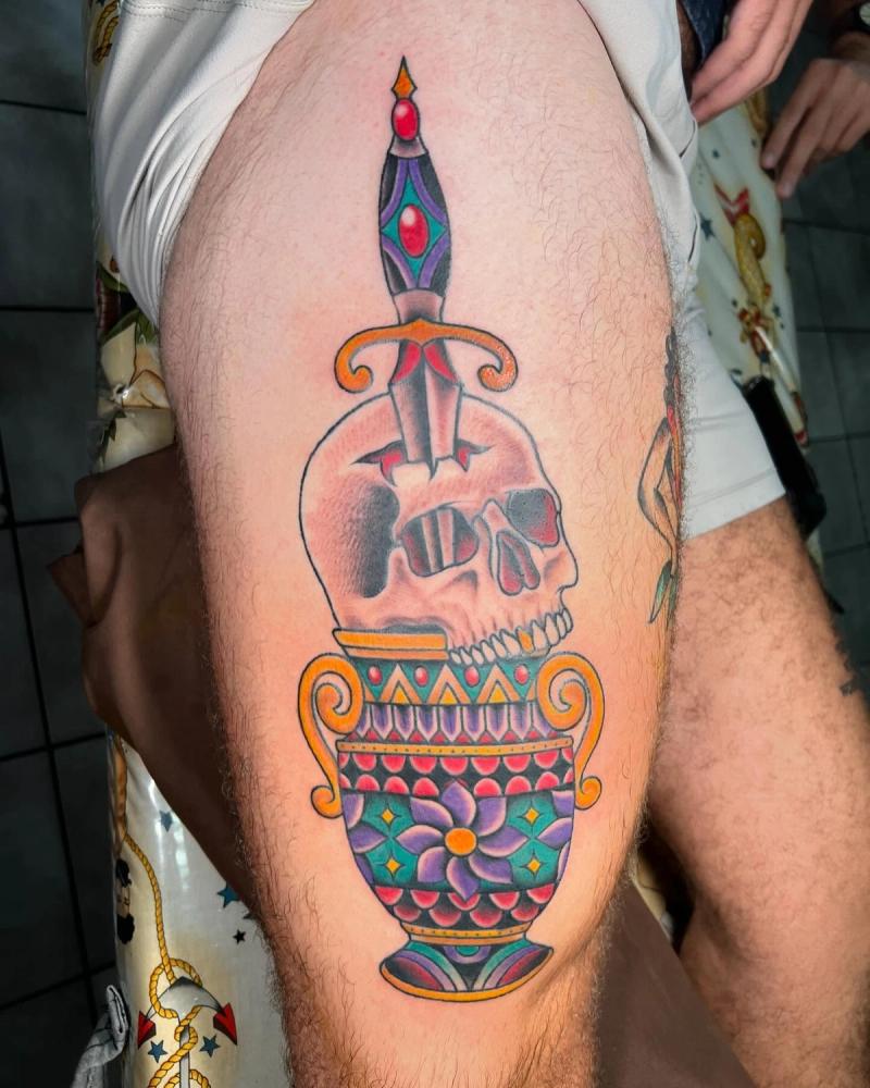Colorful Neo Traditional skull with ornate vase on thigh