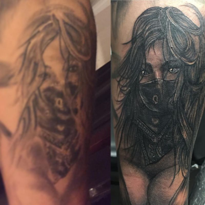 Black and grey realistic female portrait tattoo on upper arm