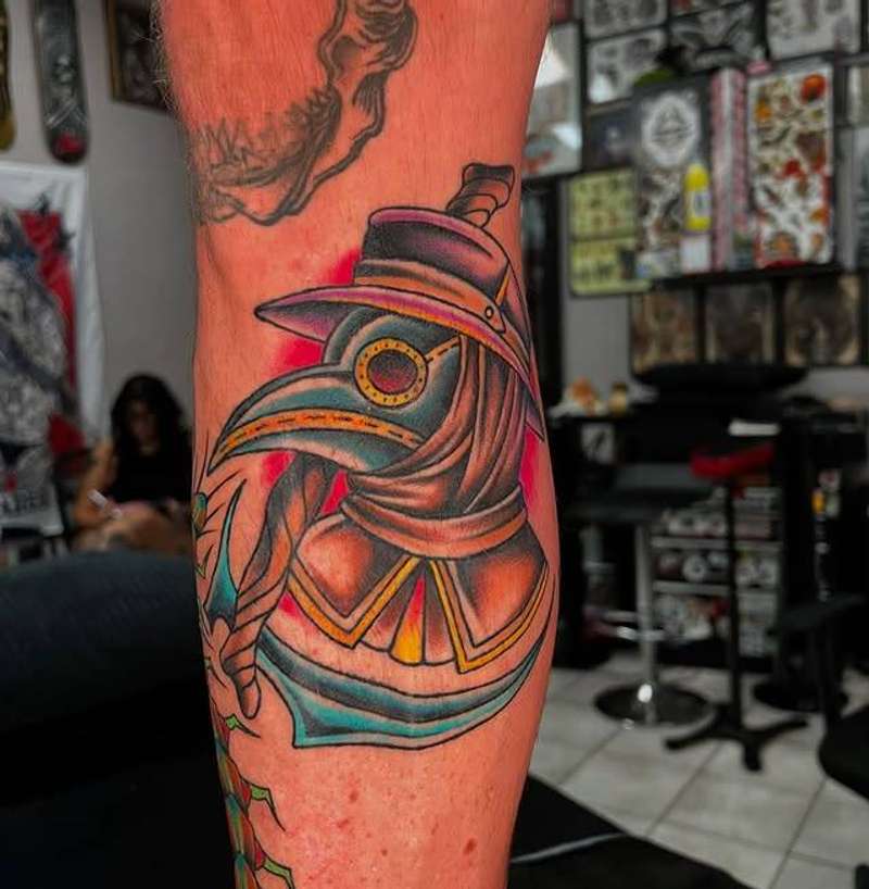 Colorful neo traditional plague doctor tattoo on forearm