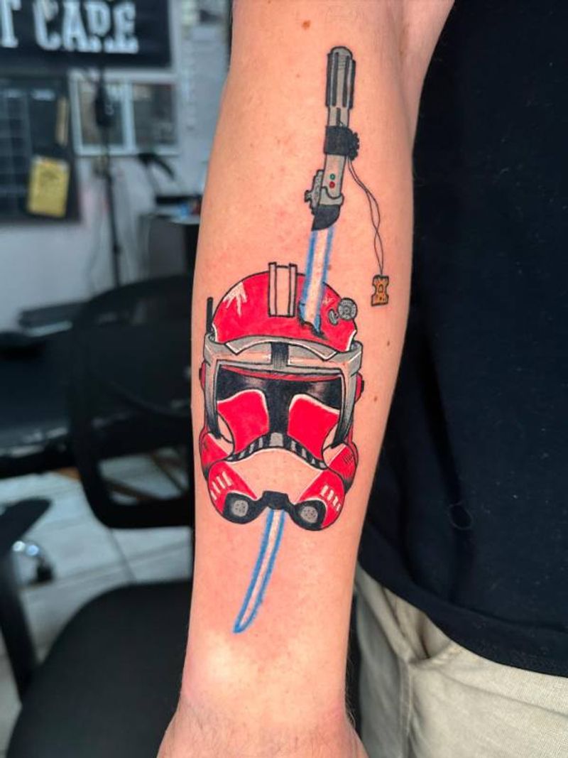 colorful star wars helmet tattoo on forearm
