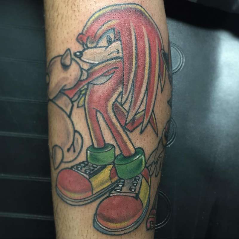 illustrative cartoon character tattoo on calf