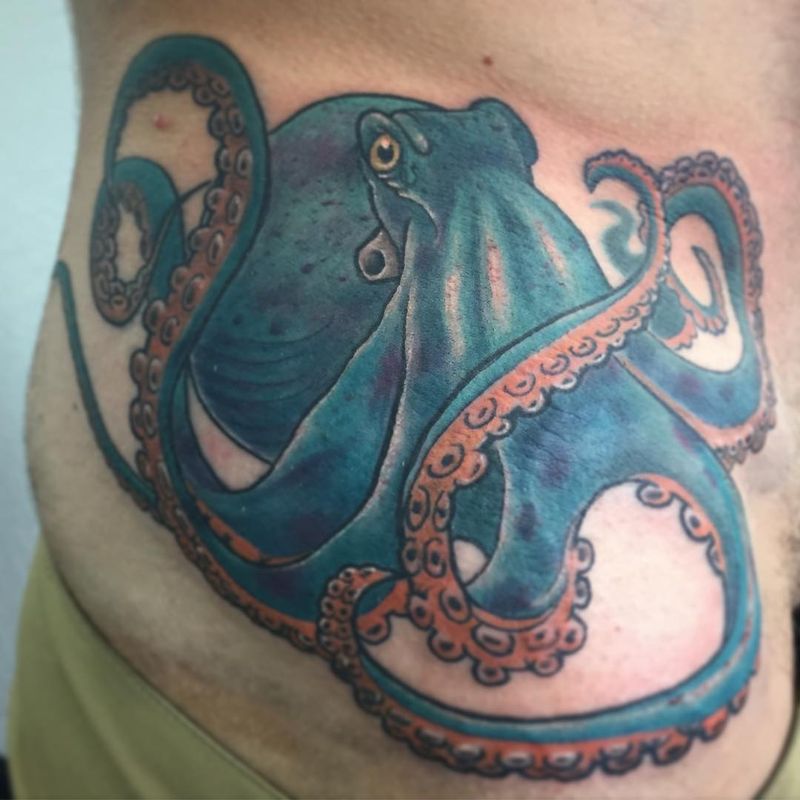 colorful octopus tattoo on torso