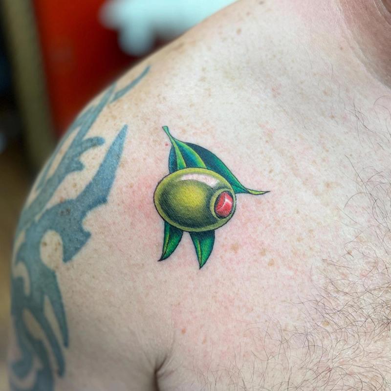 colorful olive tattoo on shoulder